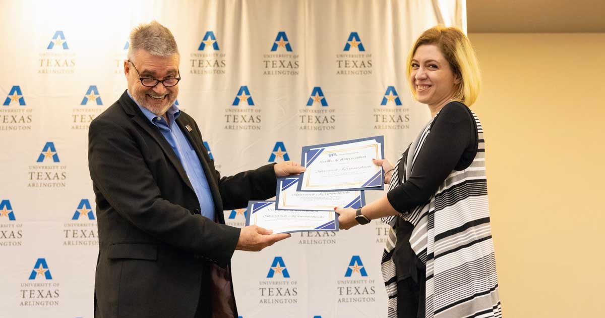 Sherri Kermanshachi getting awards from Peter Crouch, Dean of Engineering