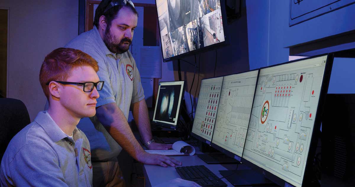 Students reviewing data on a computer screen