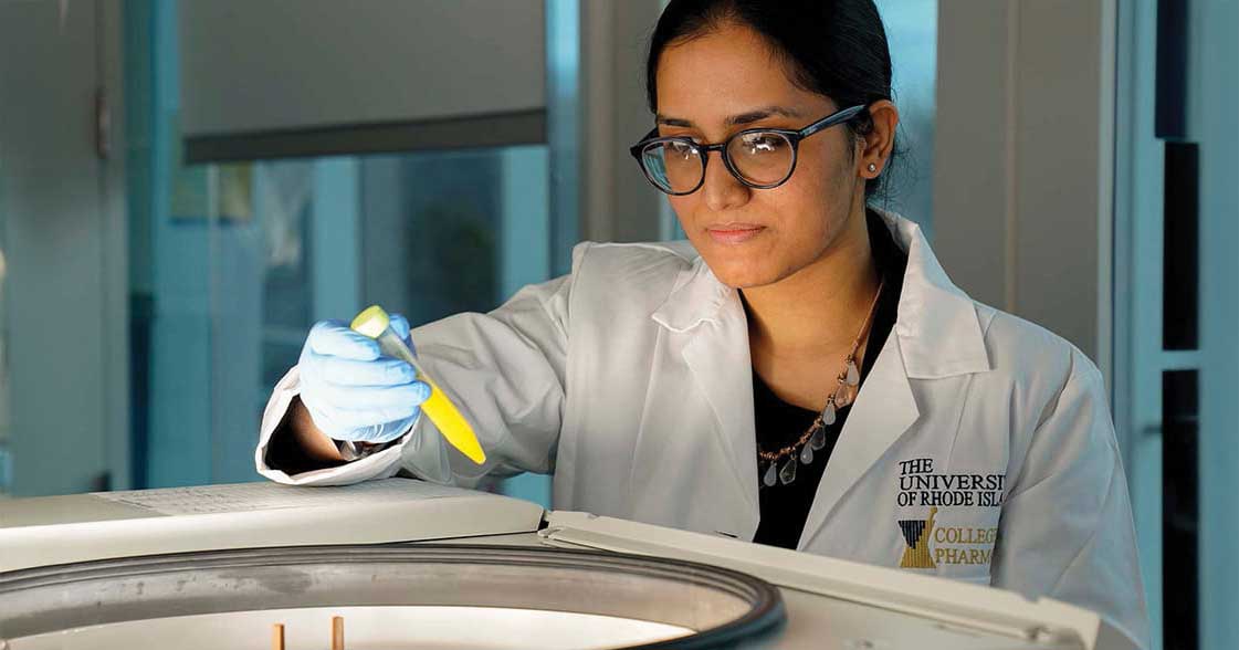 Jyothi Menon in a lab at the University of Rhode Island College of Pharmacy.