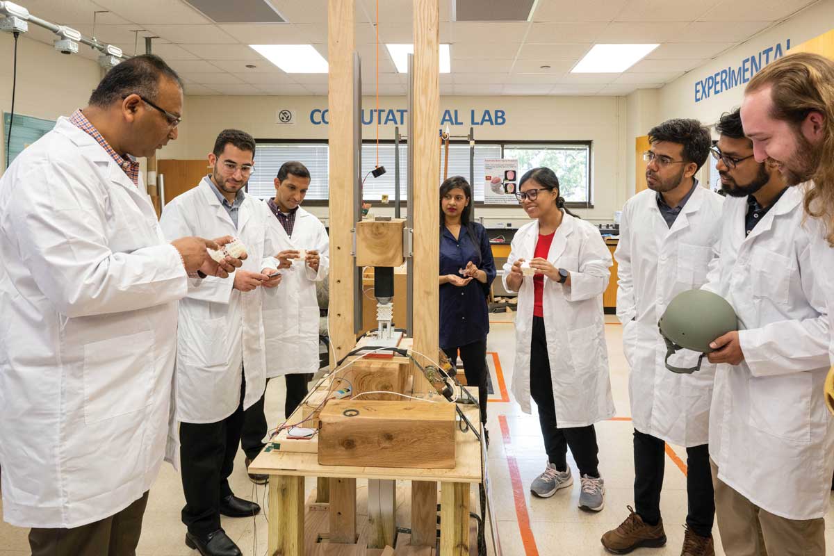 Ashfaq Adnan and five graduate students in a lab